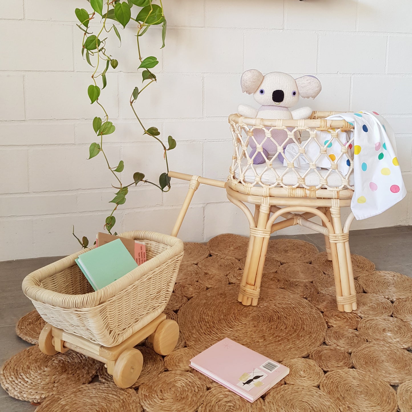 Tiny Harlow doll cot cane rattan