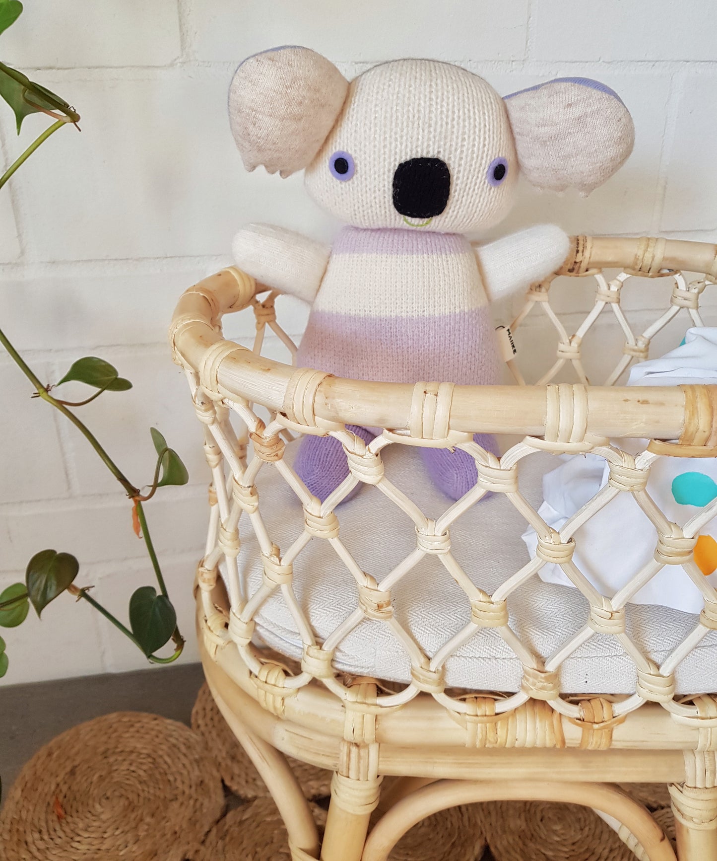 Tiny Harlow doll cot cane rattan